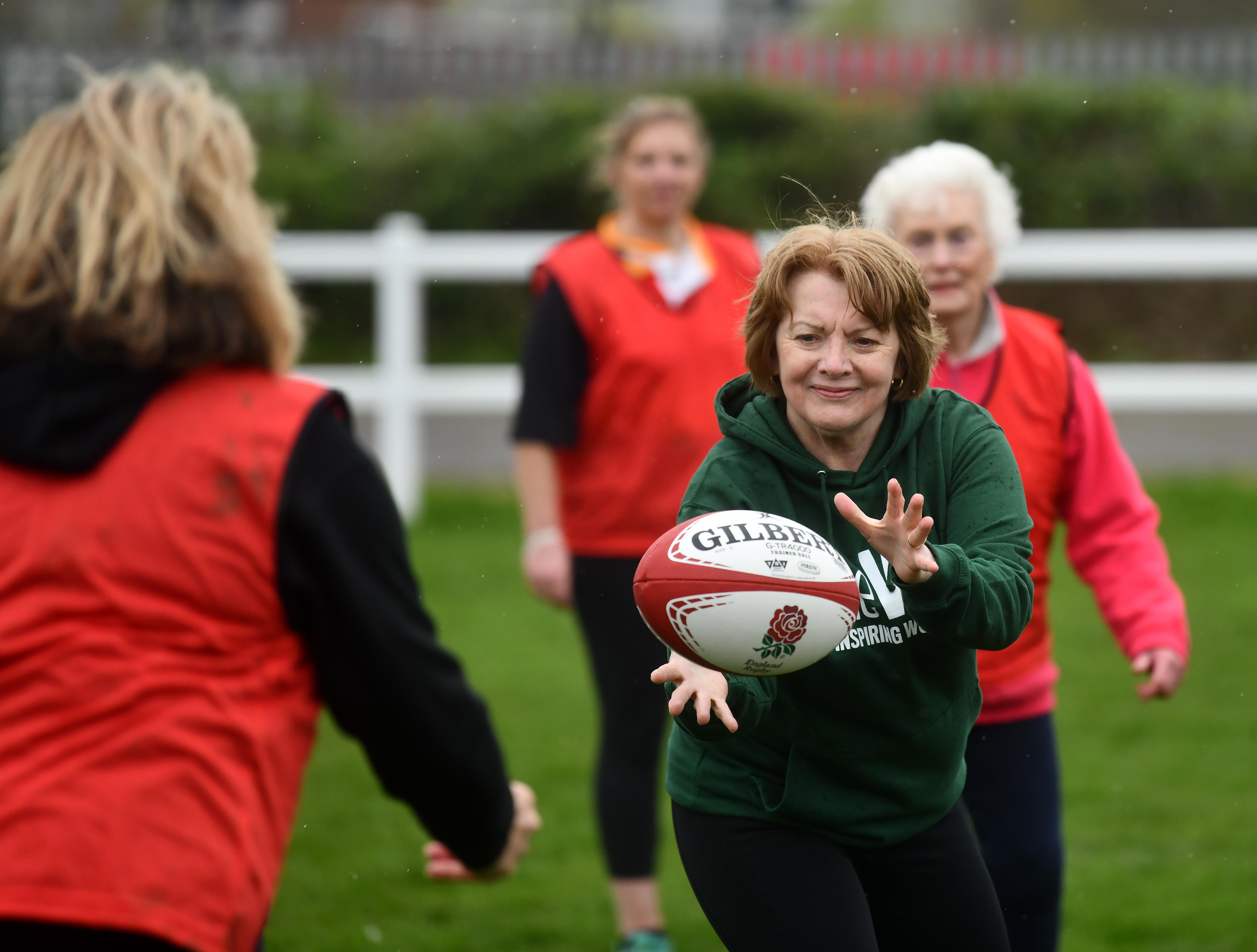 Women playing rugby