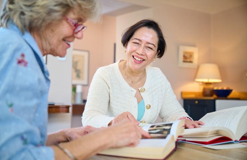 Friends looking through notes