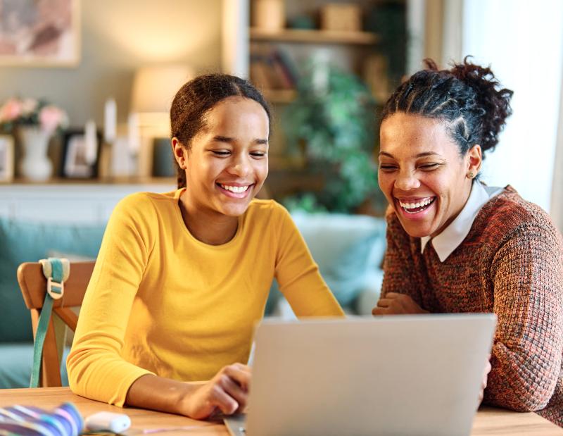 Mother assisting child